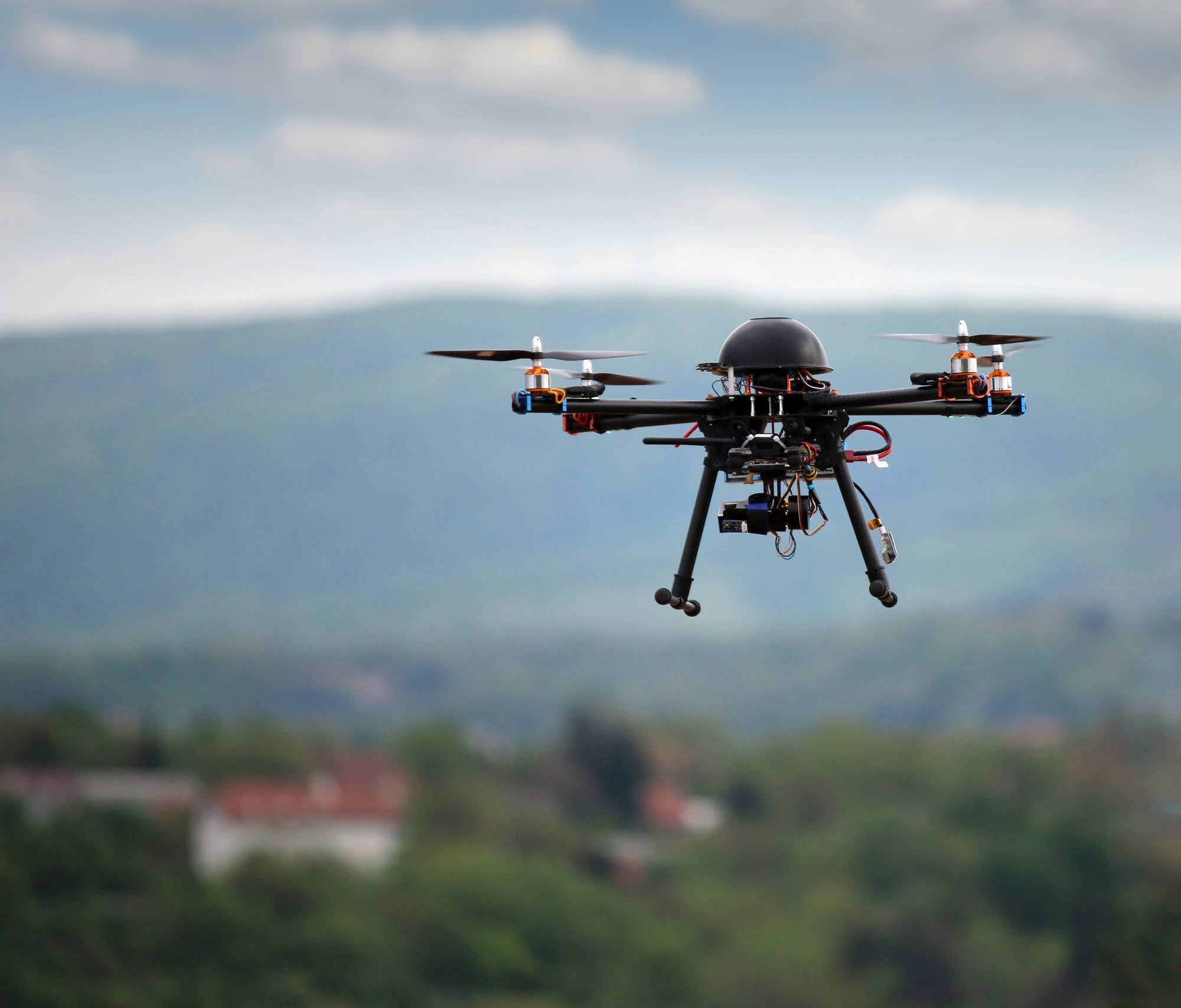FAA-certified professional drone in flight used for private investigation surveillance